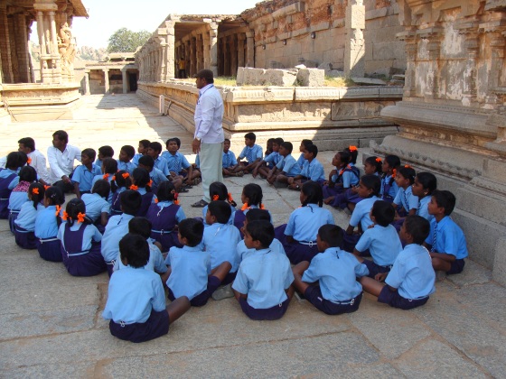 Students learning practical history inside Vittala complex at Hampi by Vikram Roy © Copyright 2012